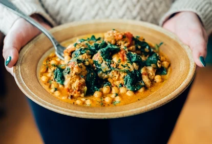 a plate of chickpea and vagatable curry