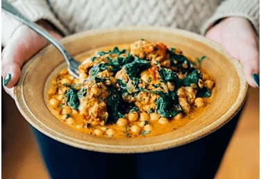 a plate of chickpea and vagatable curry