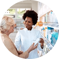 a pharmacist assisting an older person
