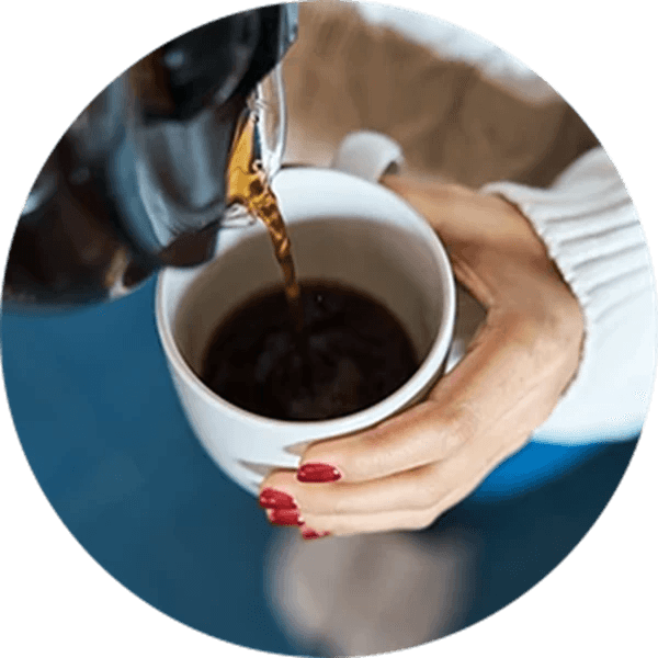 a cafetiere and mug of coffee
