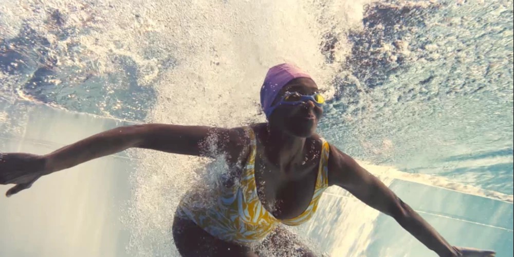 swimming woman under the water