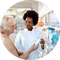 a pharmacist assisting an older person